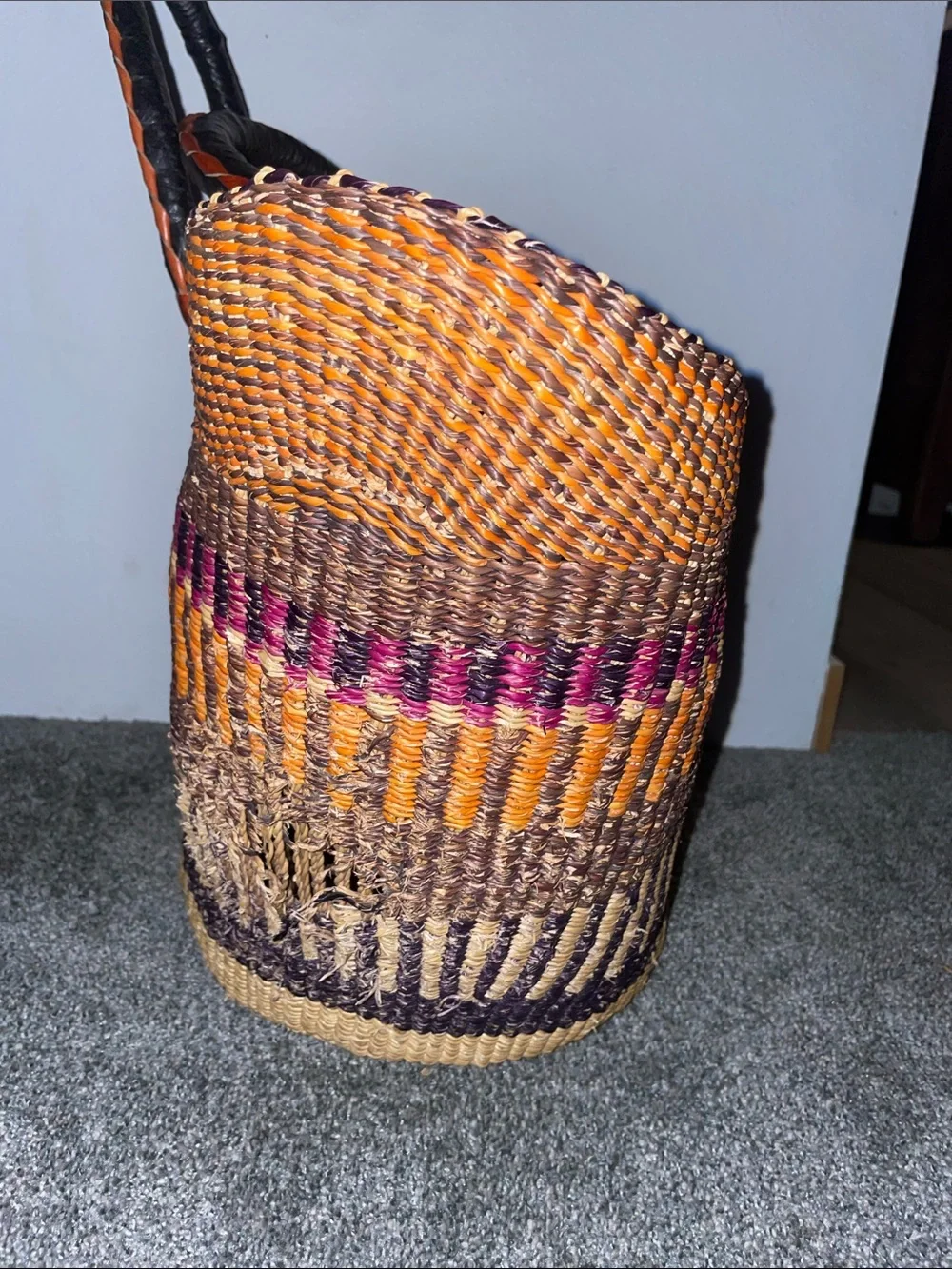 handwoven U-shaped Bolga basket (or market tote) from Ghana
